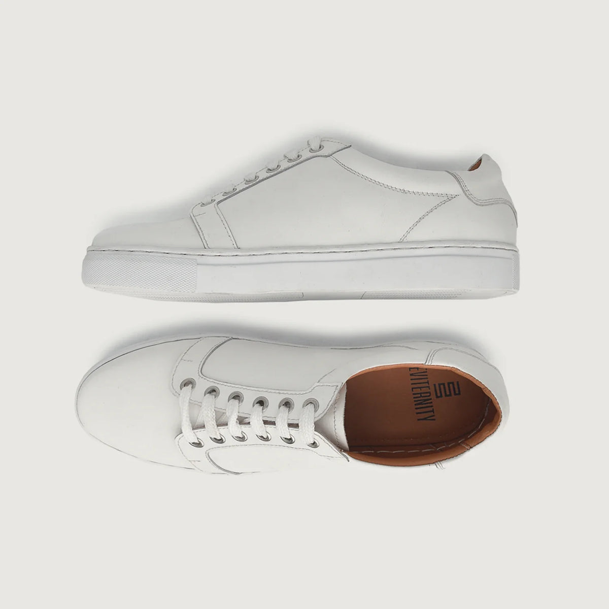 High-Traction Rubber Outsole & Lug Tread Pattern on Carter Runn White Leather Sneakers For Men
