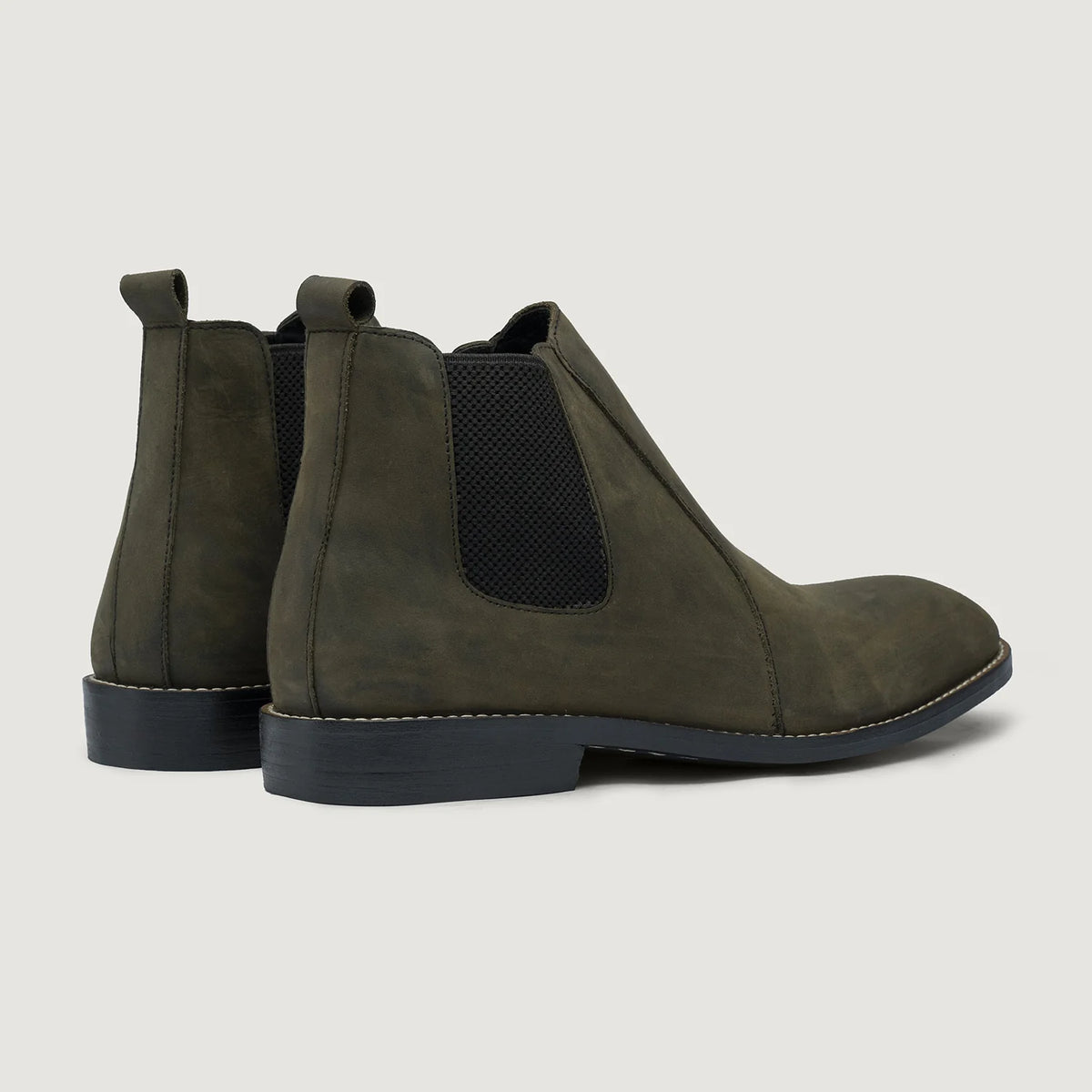 High-Traction Rubber Outsole & Lug Tread Pattern on Clarkson Chelsea Olive Pullup Leather Boots - StudGuard