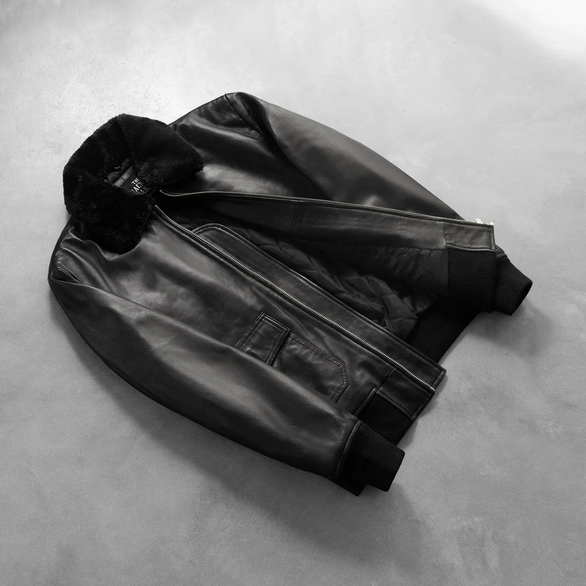 
Styled Fit Perspective of Men's Airin G-1 Black Leather Bomber Jacket on Model - Natural Daylight Drape
