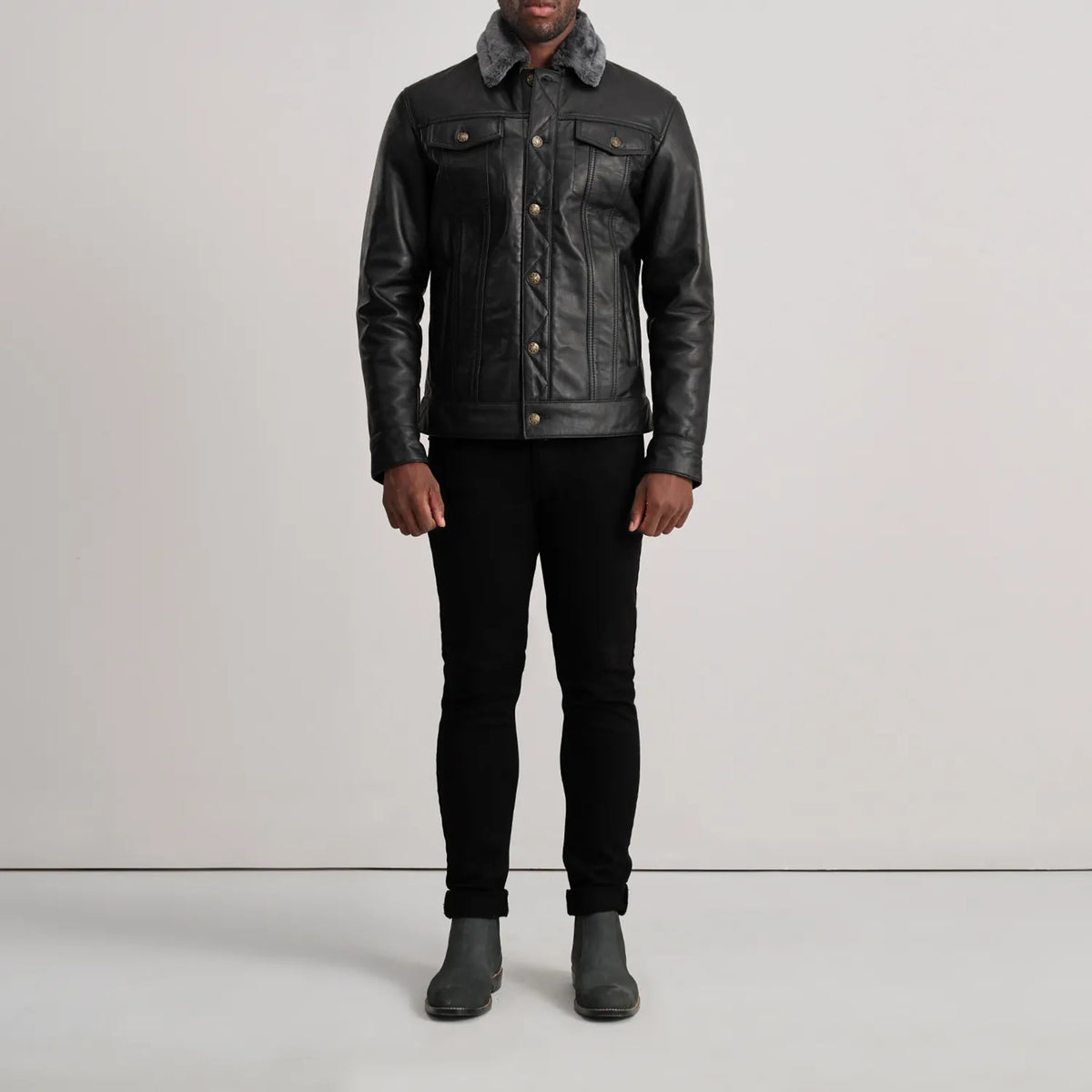 
Dallis Black Leather Shearling Trucker Jacket - Lateral Side Profile View Showing Sleeve Cut & Athletic Taper Fit
