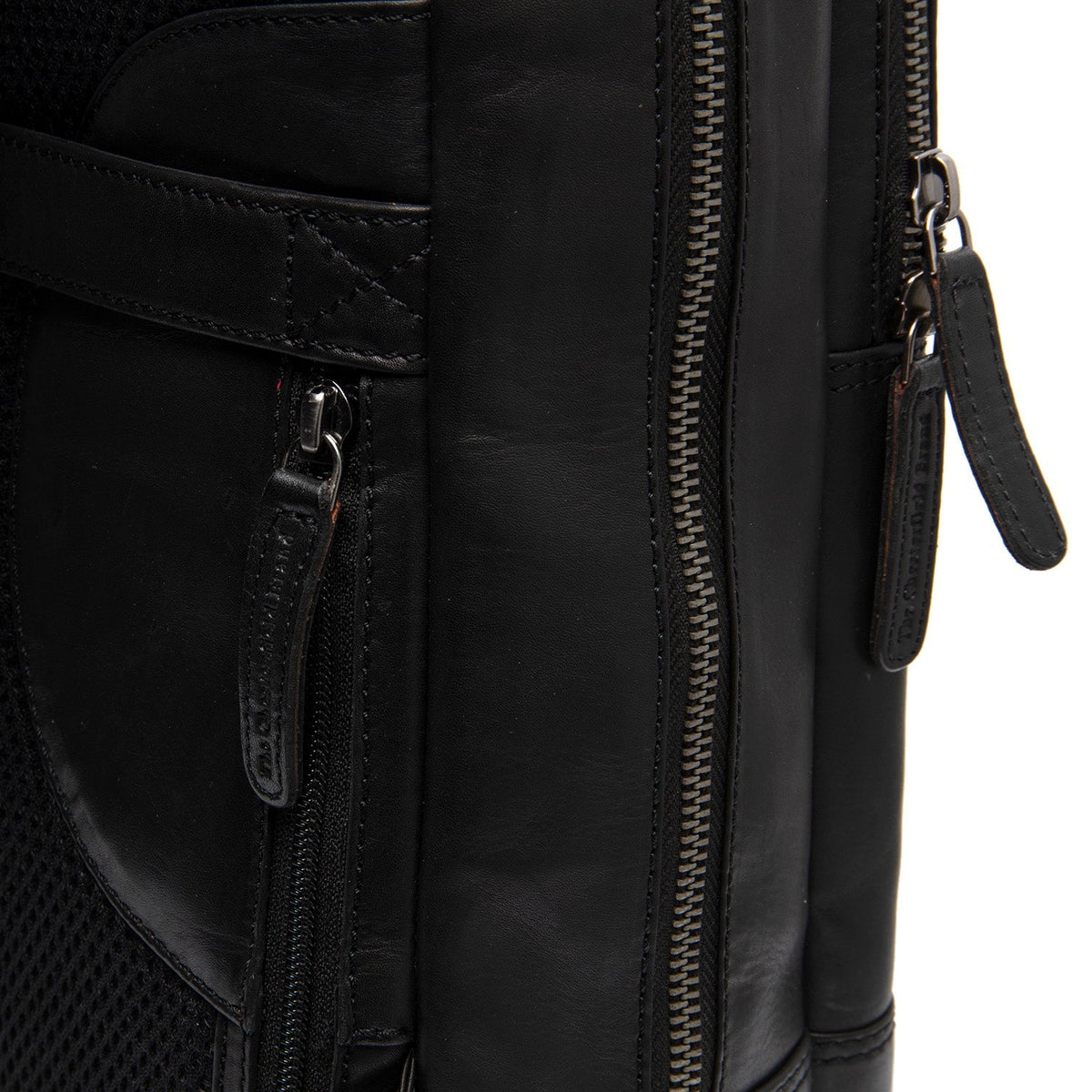 
Solid Antique Brass Hardware & Heavy-Duty Dual Zipper Detail on Nicola Full-Grain Leather Laptop Backpack