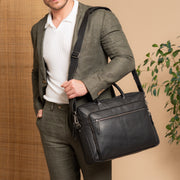 
Solid Antique Brass Hardware & Heavy-Duty Dual Zipper Detail on Tacama Full-Grain Leather Laptop Bag