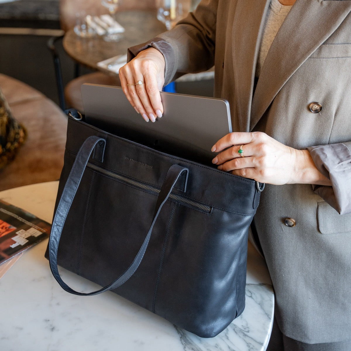 Solid Antique Brass Hardware &amp; Heavy-Duty Dual Zipper Detail on Osira Full-Grain Leather Tote Bag