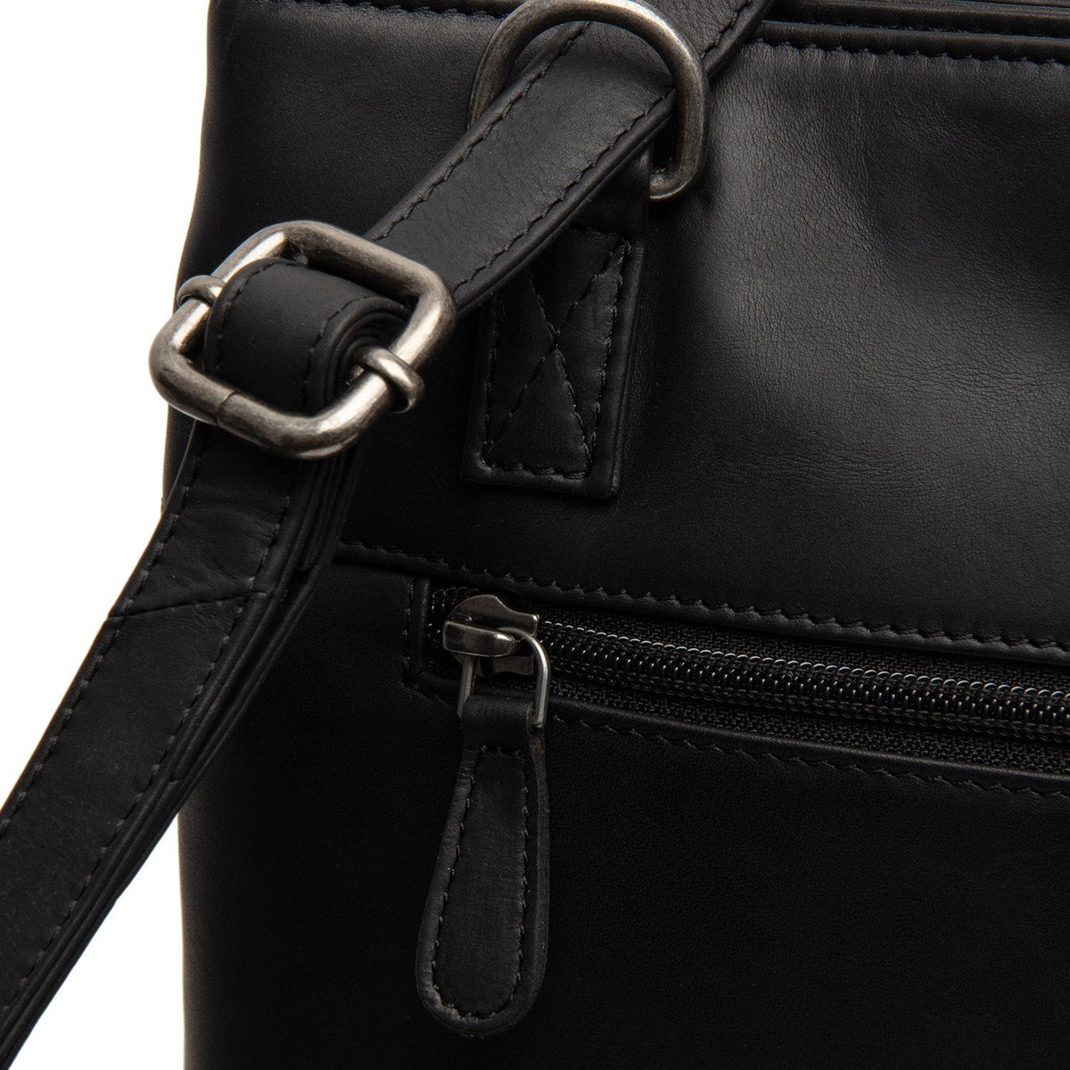 
Solid Antique Brass Hardware & Heavy-Duty Dual Zipper Detail on Raynor Full-Grain Leather Tote Bag