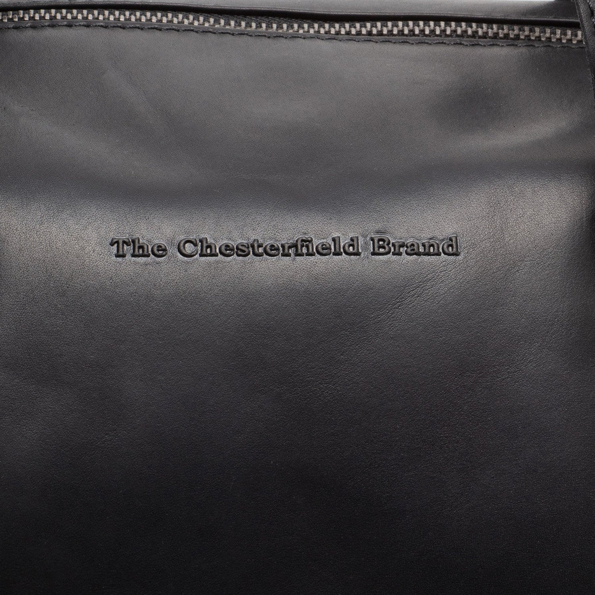 
100% Full-Grain Wax Pull-Up 100% Full-Grain Leather Grain Texture & Handcrafted Patina Detail