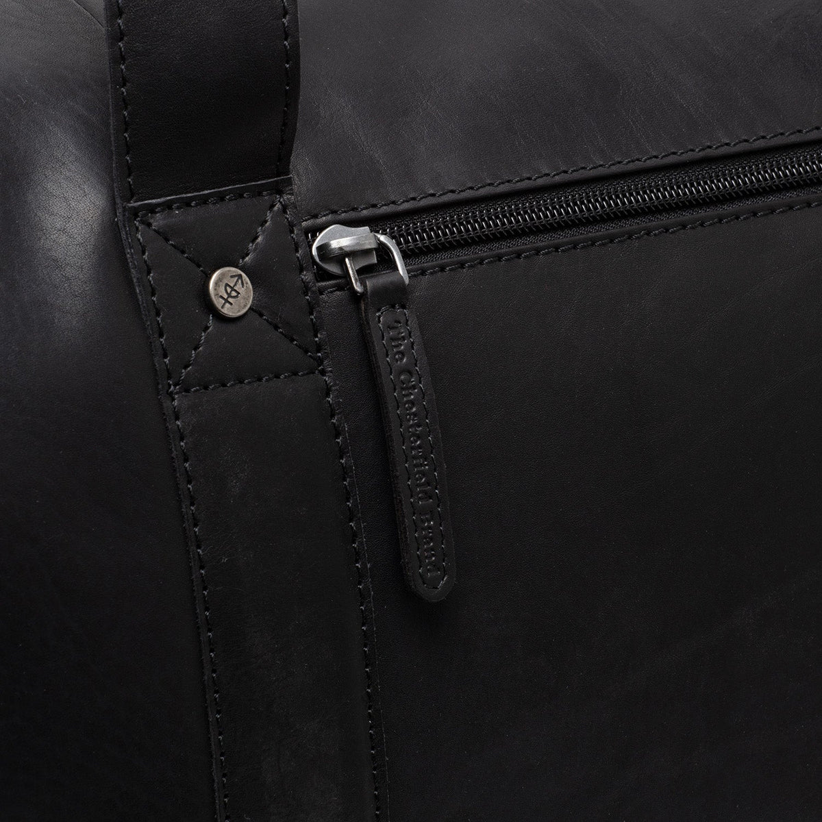 
Reinforced Leather Base with Protective Metal Studs Detail