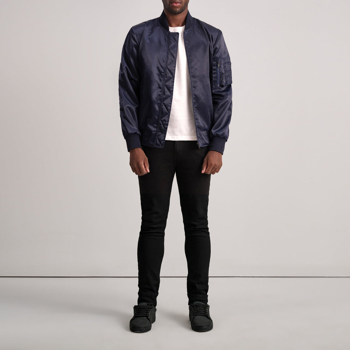 Close-Up Detail of Varsity &amp; Zipper Hardware on Quinton MA-1 Blue Bomber Jacket
