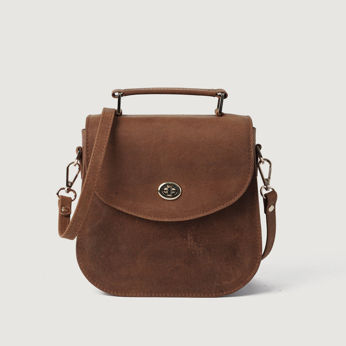 
The Sandra Vintage Tan Leather Saddle Bag For Women in Tan Full Grain Naturally Milled Cowhide Leather. - Full Exterior Front Profile View | Buy Online